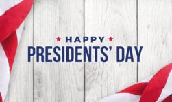 Happy Presidents‘ Day Text with Flags Over White Wood